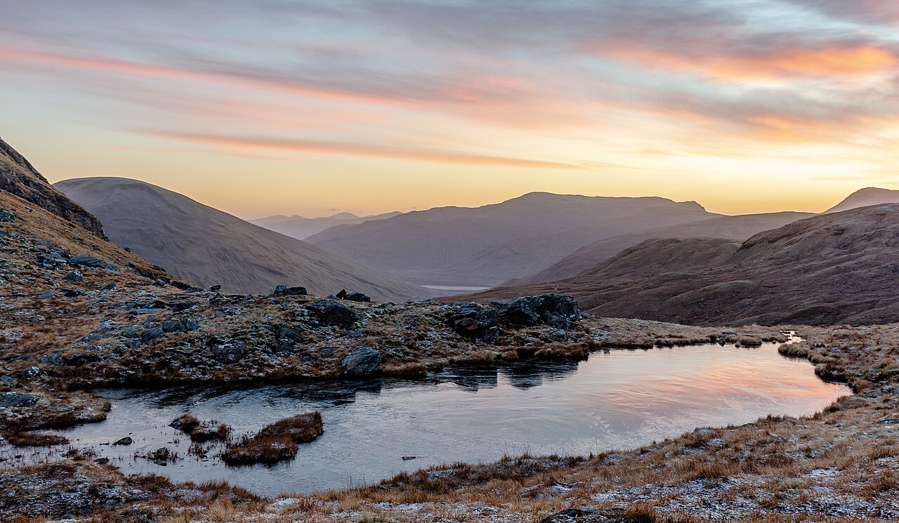 A small loch in the saddle between Beinn an Dothai