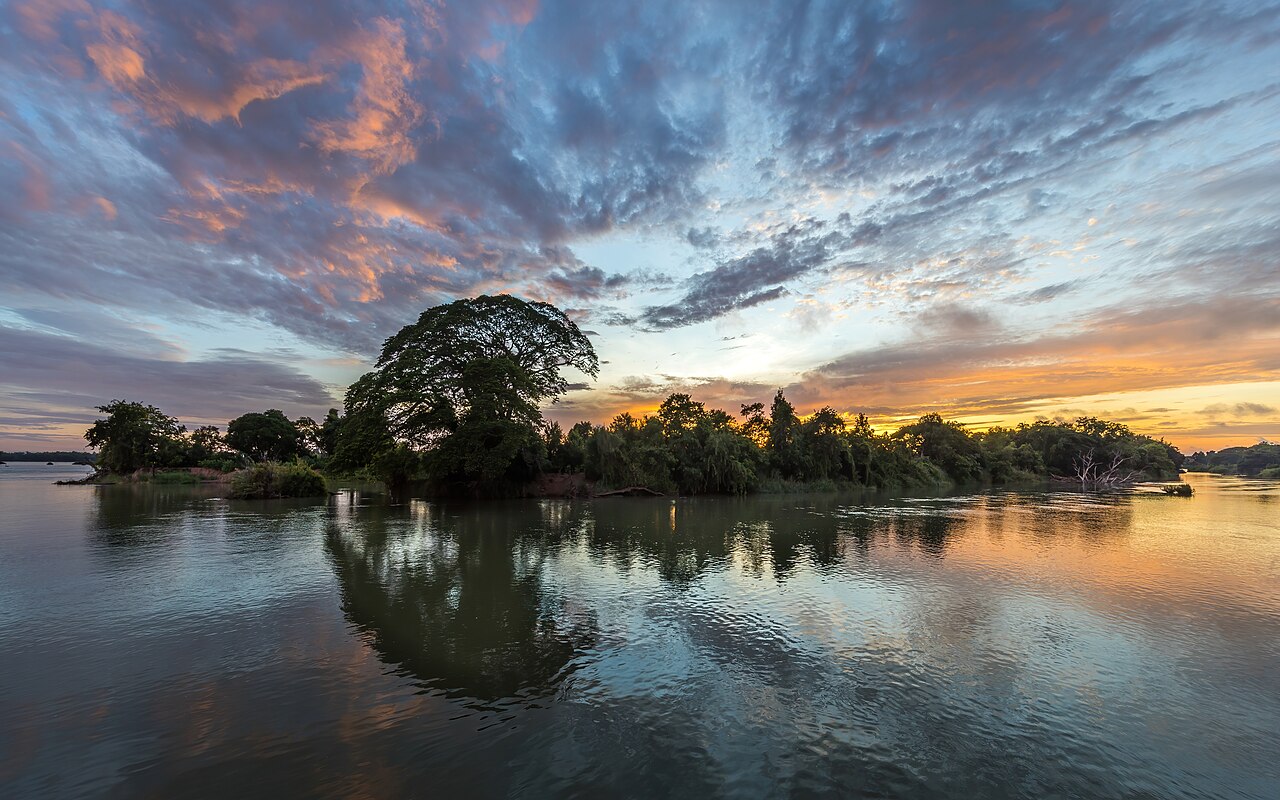 Colorful clouds and blue sky with water reflection