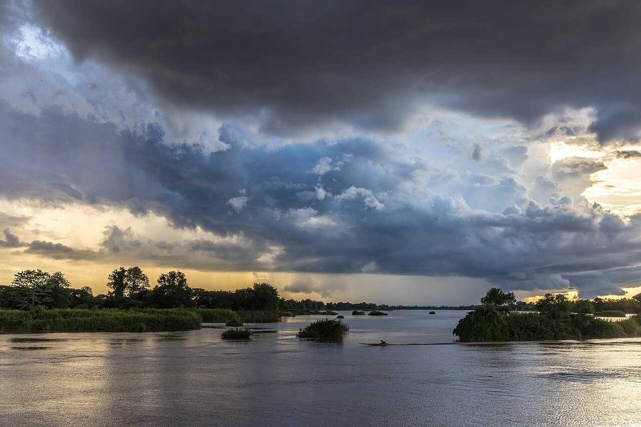 Blue and orange clouds over the Mekong with a piro