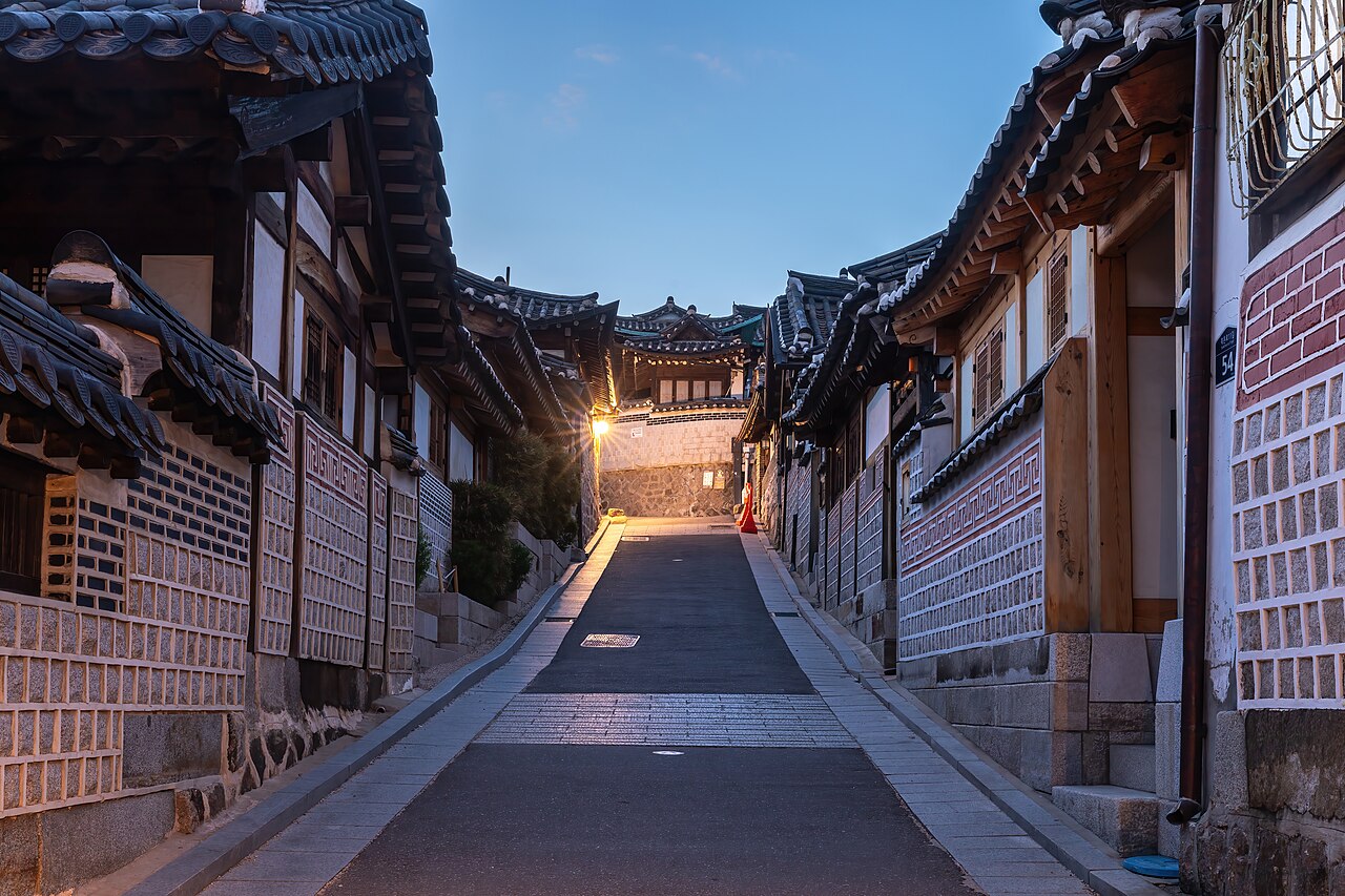 Bukchon-ro 11-gil street with hanok houses at blue